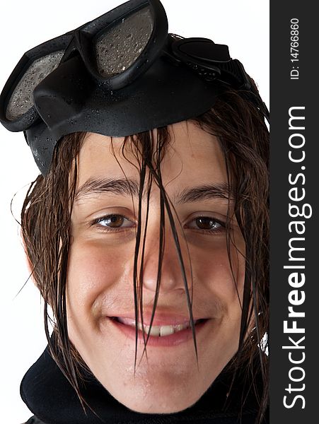 Attractive teenager with long wet hair, wearing a diving mask on a white background. Attractive teenager with long wet hair, wearing a diving mask on a white background