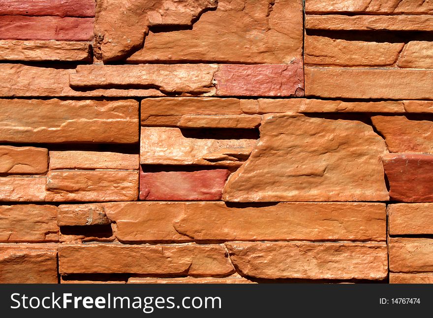 Fine details of a brick wall as texture or for background purposes