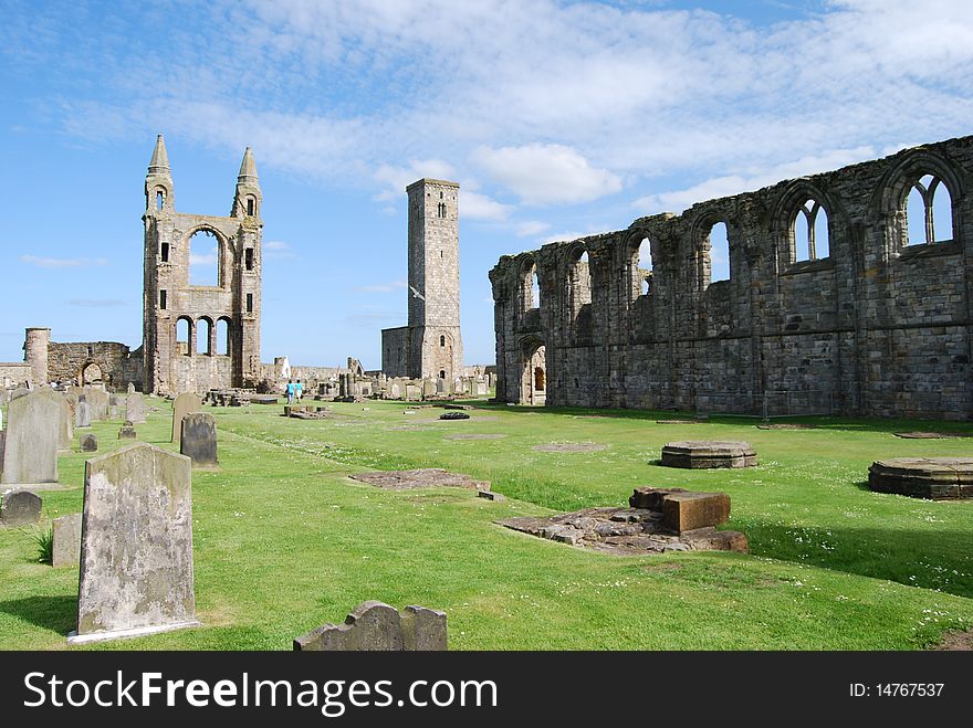 The ruined cathedral at St. Andrews with some old grave stones. The ruined cathedral at St. Andrews with some old grave stones