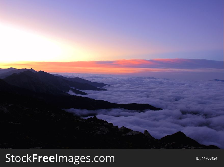 Scenery of mountains in the sea of clouds at sunrise. Scenery of mountains in the sea of clouds at sunrise