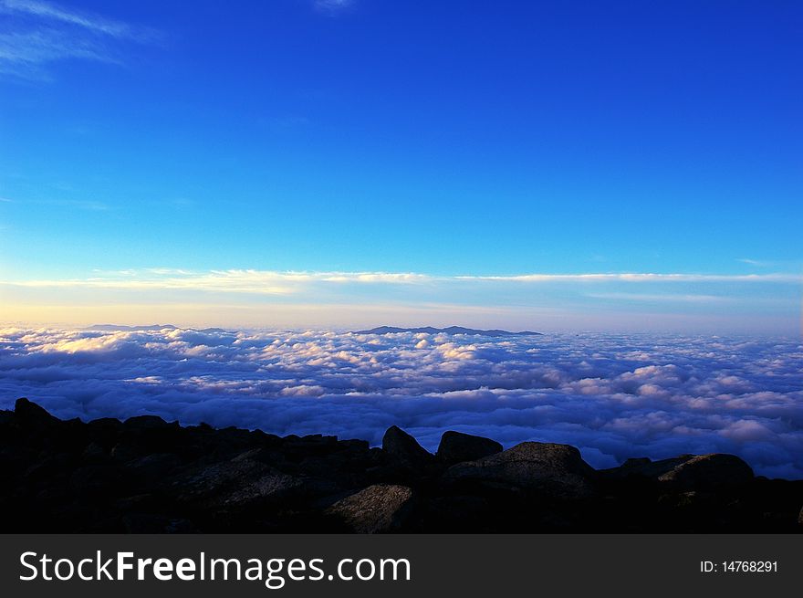 Scenery of the sea of clouds on the top of mountains at sunrise. Scenery of the sea of clouds on the top of mountains at sunrise