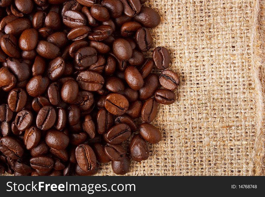 Roasted coffee beans on textile