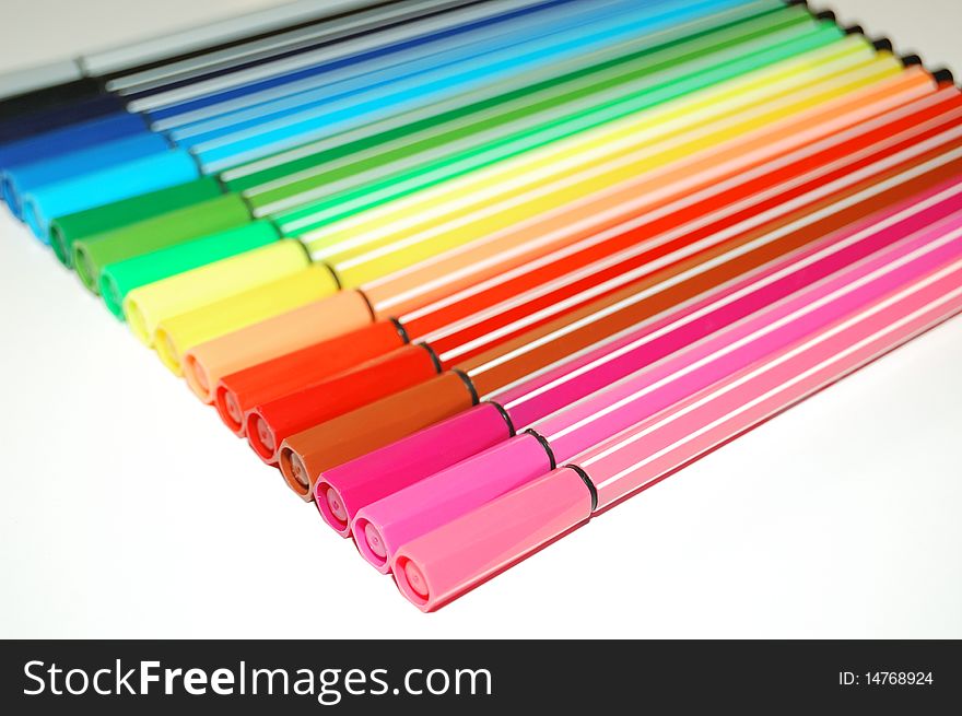 Row of many-colored felt-tip pens