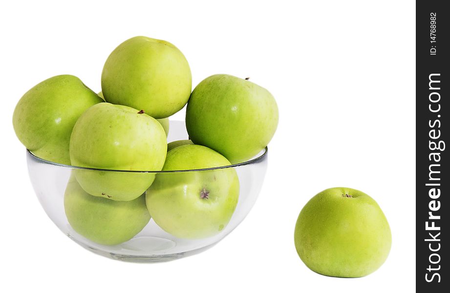 Isolated green apples in a glass bowl