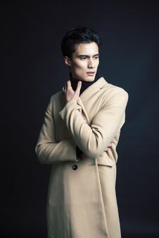 Handsome Asian Fashion Looking Man Posing In Studio On Black Background, Lifestyle Modern People Concept Stock Image