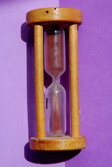 Hourglass On A Purple Background Royalty Free Stock Image Hourglass On A Purple Background Royalty Free Stock Image