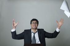 Businessman Throwing Documents Away! Royalty Free Stock Image Businessman Throwing Documents Away! Royalty Free Stock Image