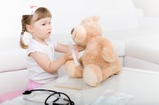 Little Girl Doctor With Teddy Bear Stock Image Little Girl Doctor With Teddy Bear Stock Image