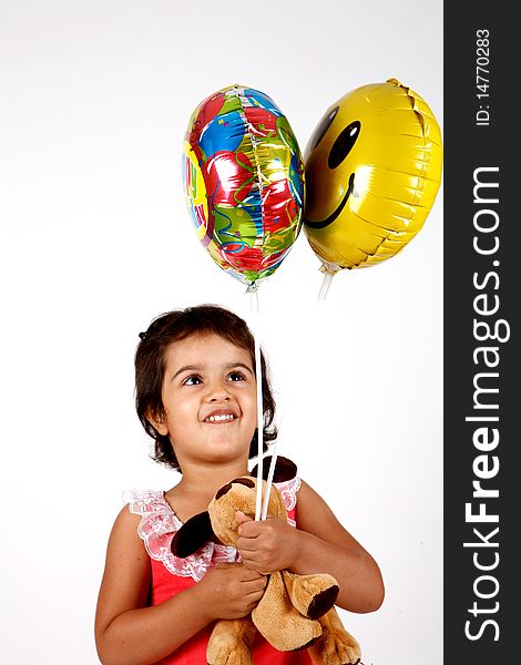 Sweet and cute toddler playing with ballons. Sweet and cute toddler playing with ballons