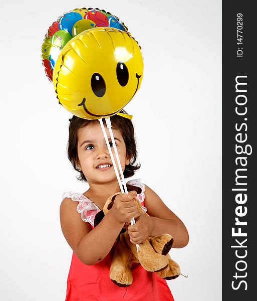 Sweet and cute toddler playing with ballons. Sweet and cute toddler playing with ballons