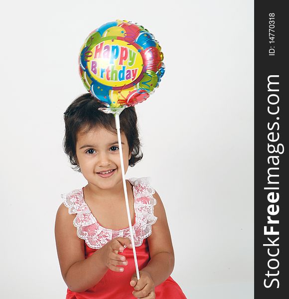 Sweet and cute toddler playing with ballons. Sweet and cute toddler playing with ballons