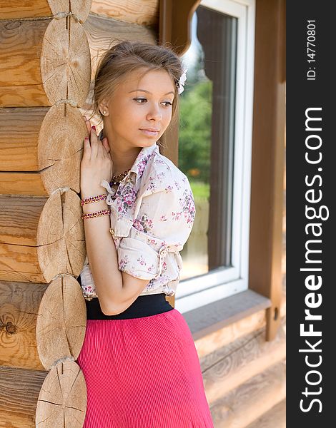 Girl standing on a veranda. Girl standing on a veranda