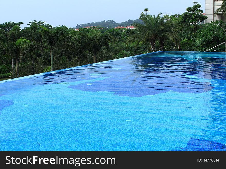 Swimmin pool in a resort, clean and bright water. Swimmin pool in a resort, clean and bright water