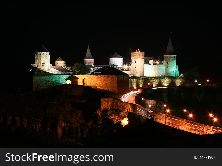 Kamianets-Podilskyi Castle at night, western Ukraine.