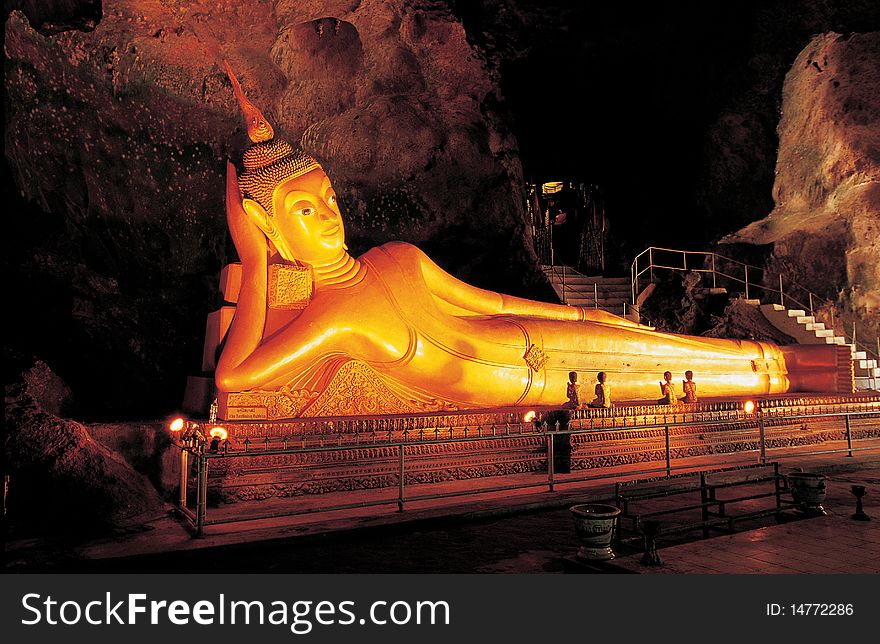 Reclining Buddha image in the cave
