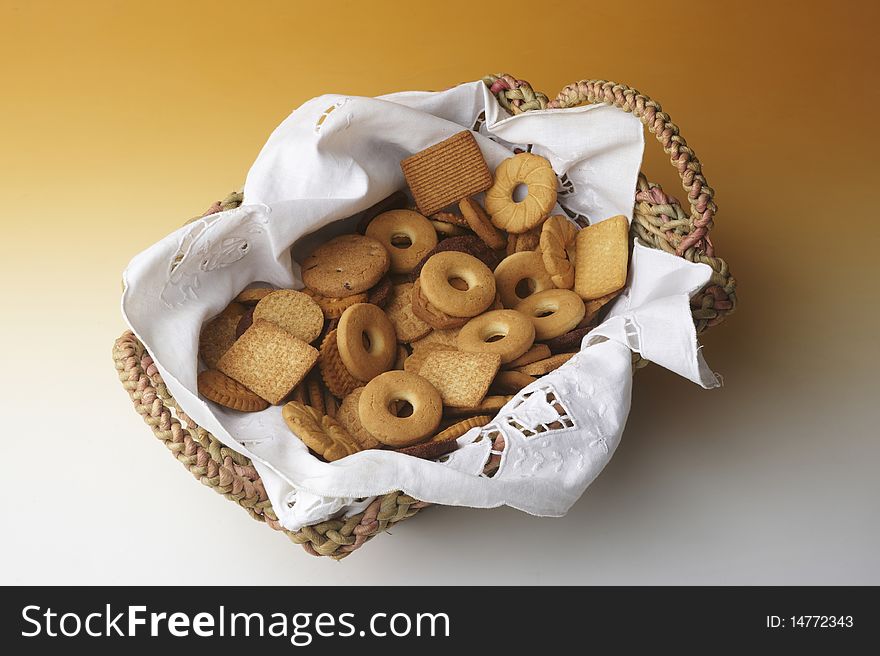 Still life with a basket of biscuits