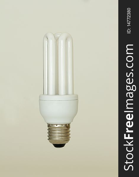 A energy saving light bulb on a white background