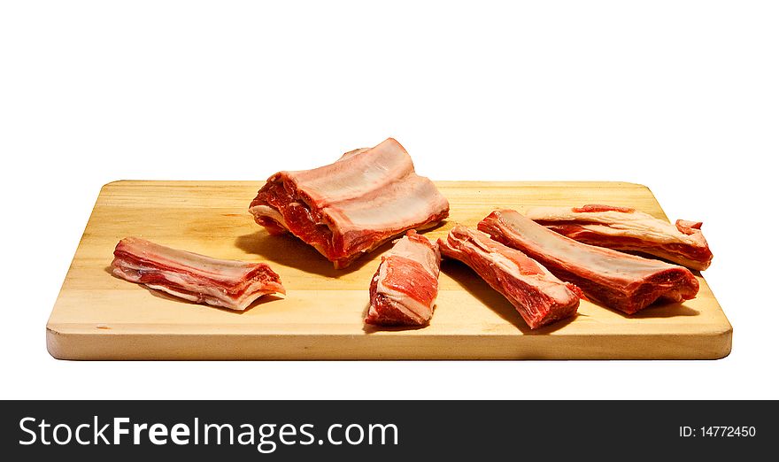 Mutton ribs on chopping board. Mutton ribs on chopping board