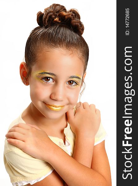 Beautiful six year old girl in bright yellow make-up. Beautiful six year old girl in bright yellow make-up.