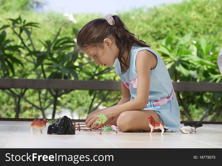 Portrait of little girl having good time in summer environment. Portrait of little girl having good time in summer environment