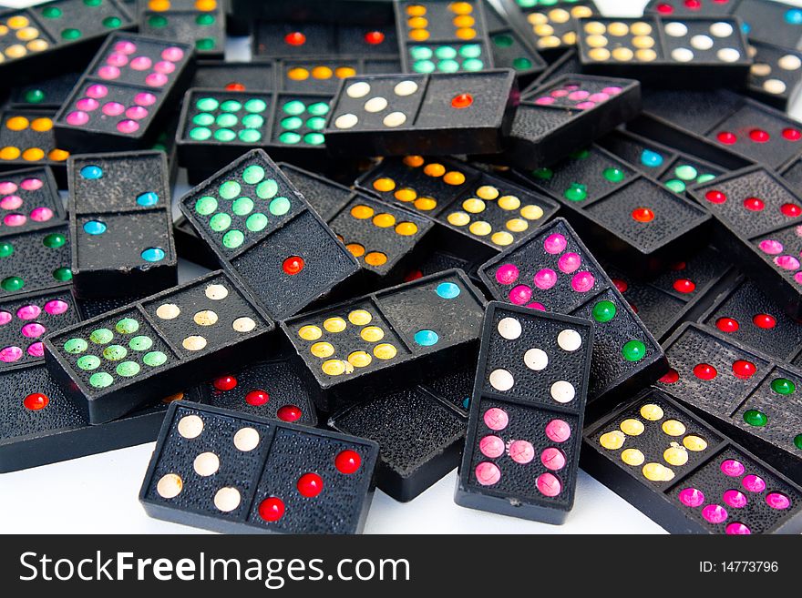 Black dominos on the white background