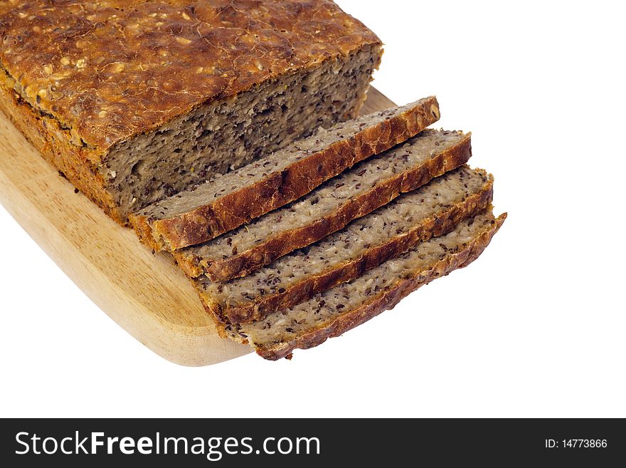 Rye bread on wooden board isolated white background