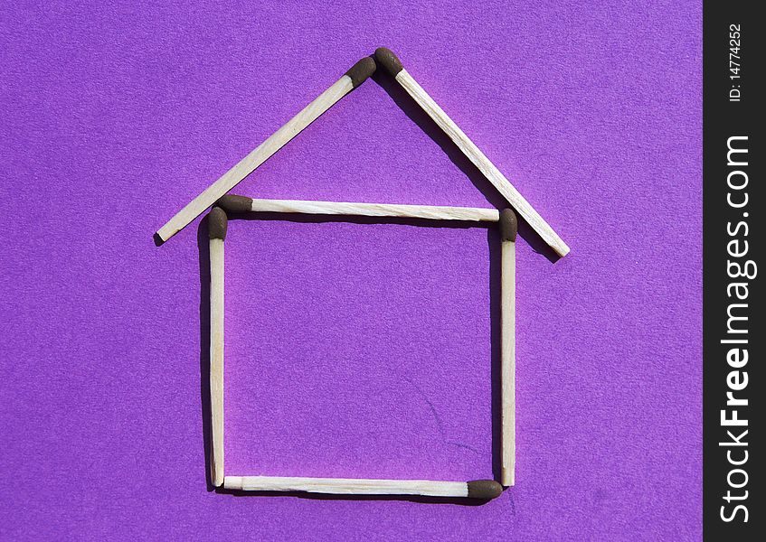 The idea of an house created with some matches. The idea of an house created with some matches