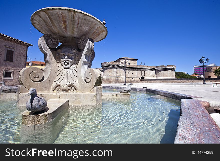 Della Rovere Medieval Castle in Senigallia and historic fountain in the square