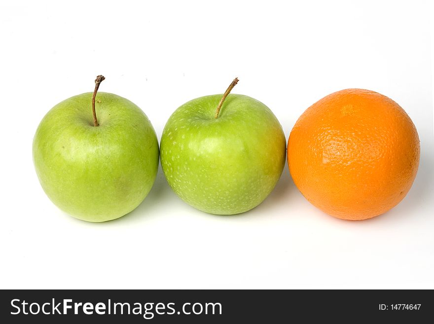 Two green apples and one orange