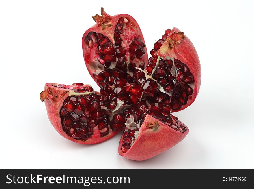 Red and Ripe Pomegranate, isolated on white. Red and Ripe Pomegranate, isolated on white