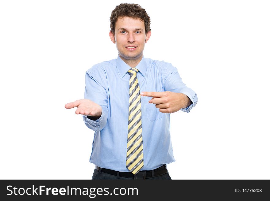 Young adult points with his finger to his other empty hand, advertisement concept, studio shoot isolated on white background. Young adult points with his finger to his other empty hand, advertisement concept, studio shoot isolated on white background