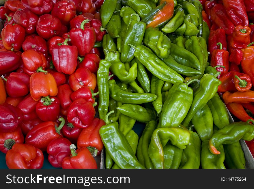 colored peppers photographed in a Paris market