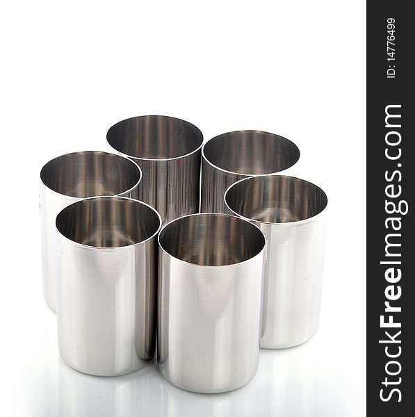 Stainless steel silver mugs on isolated background. Stainless steel silver mugs on isolated background