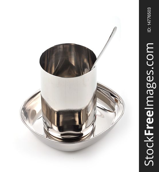 Stainless steel silver mug with plate and spoon. Stainless steel silver mug with plate and spoon