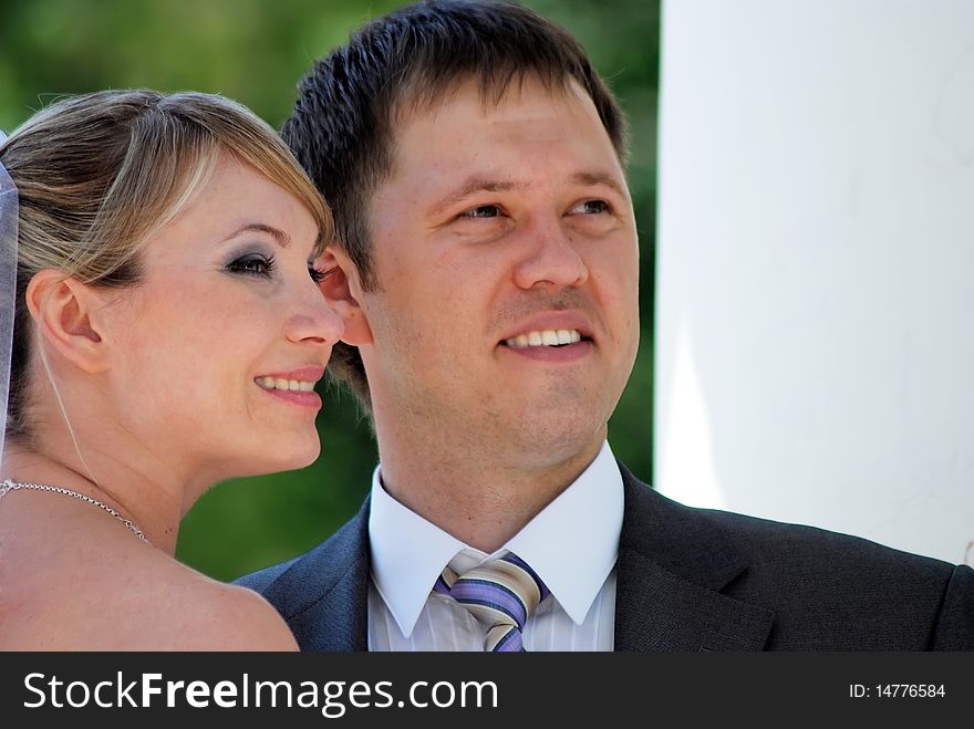 Portrait of a happy young couple in park