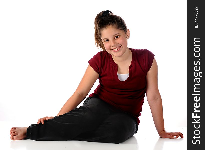 A full length portrait of a lovely preteen girl. Isolated on white.