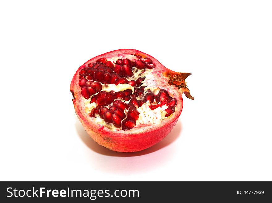 Photo of the pomegranate on white background