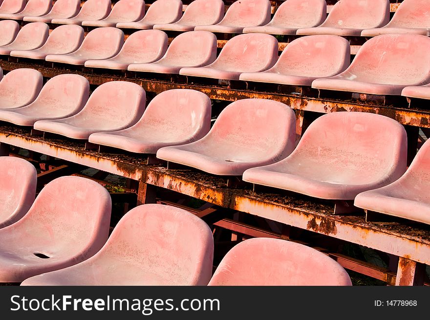 Old red seats in a Stadium