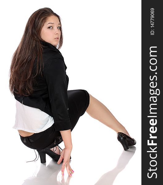 Girl in shoes on heels, on a white background, it is isolated. Girl in shoes on heels, on a white background, it is isolated.