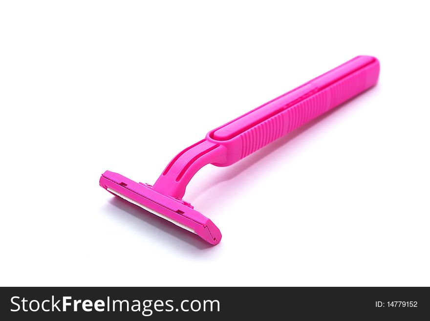 Photo of pink razor on white background