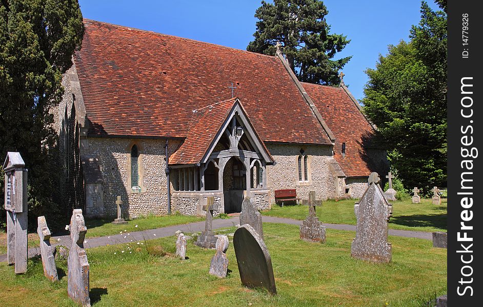 English Village Church and Graveyard in early Summer. English Village Church and Graveyard in early Summer