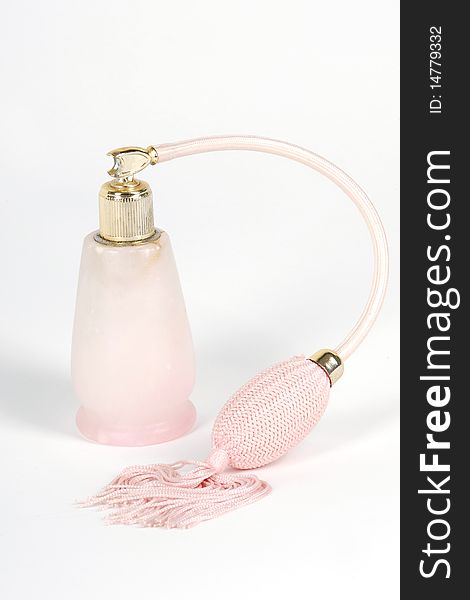 Pink perfume classic bottle with tassel vaporizer. Pink perfume classic bottle with tassel vaporizer