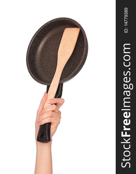 Woman holding frying pan for cooking in the hand