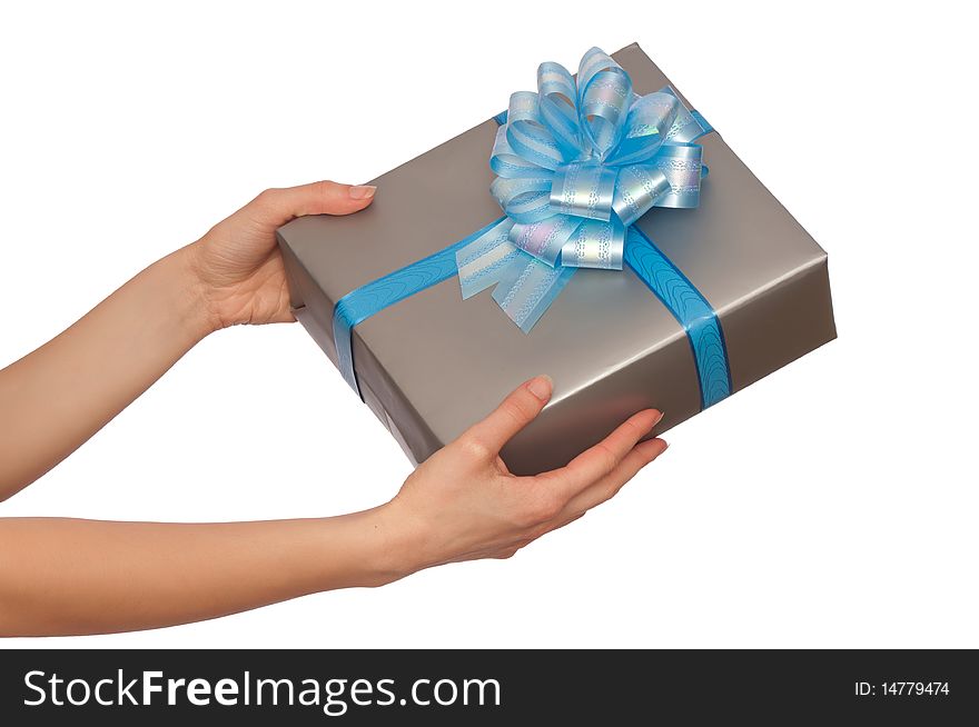 Woman giving a green box with yellow bow as a gift. Woman giving a green box with yellow bow as a gift