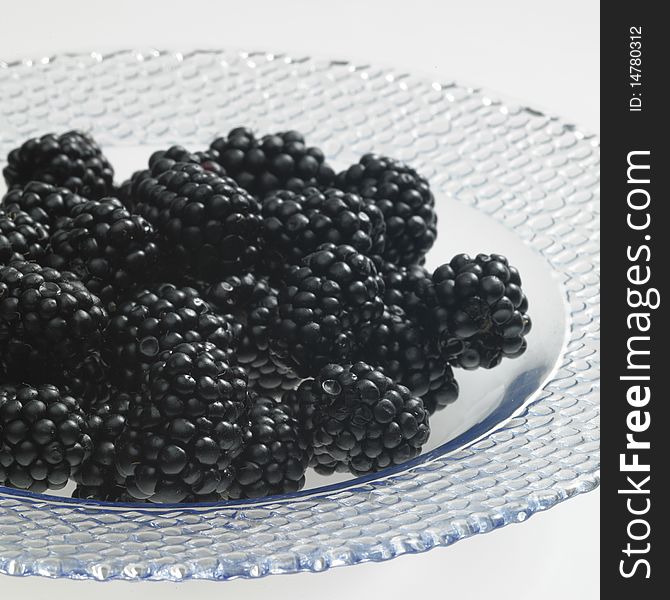 Still life of blackberries on a plate
