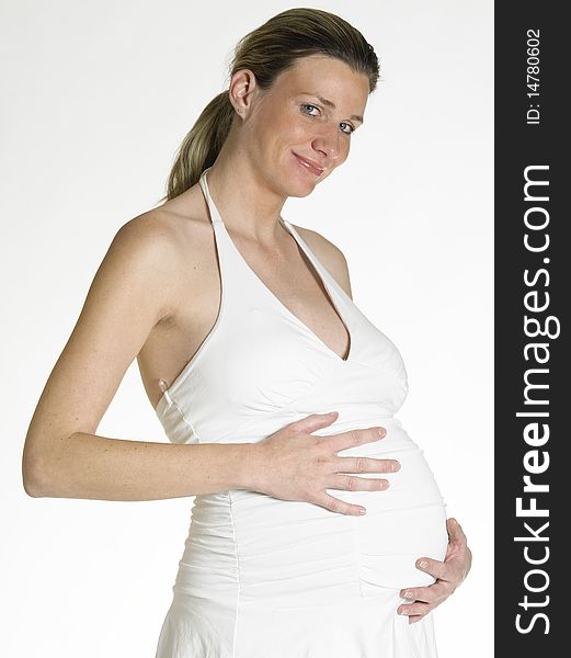 Portrait of standing pregnant woman