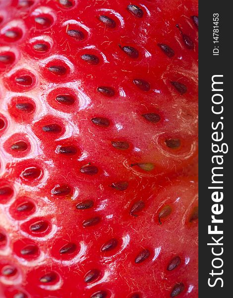 Close up on a strawberry's skin.