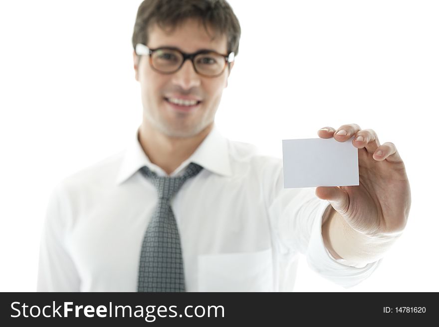 Businessman with blank businesscard, focus on foreground. Copy space for your own text.