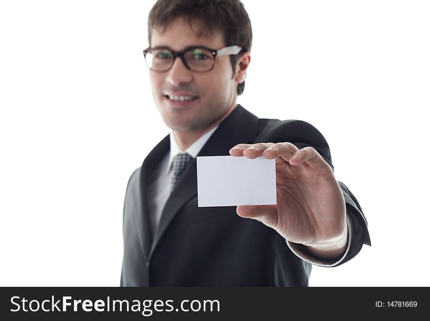 Businessman with blank businesscard, focus on foreground. Copy space for your own text.