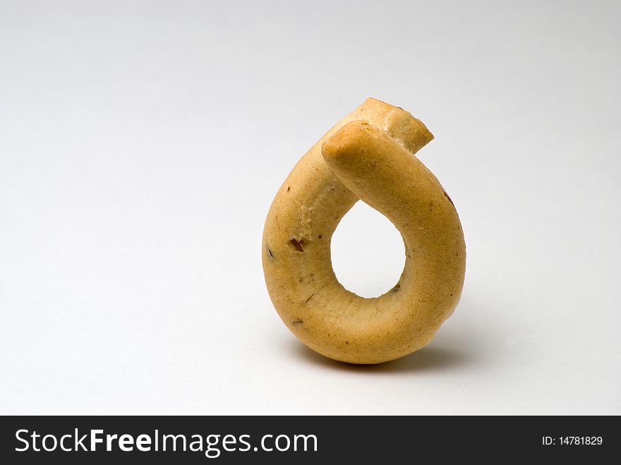 Crusty bagel in shape of 6